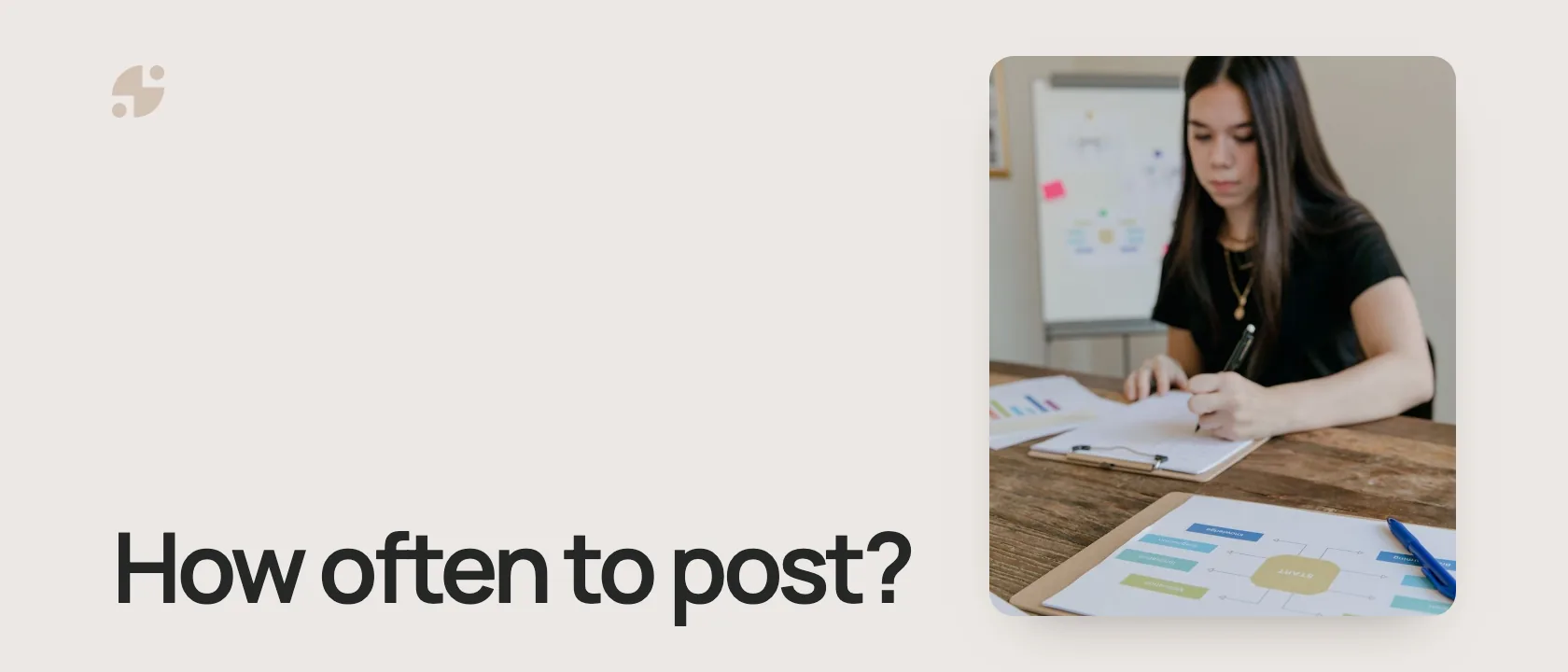 How often to post? A woman planning at a desk.