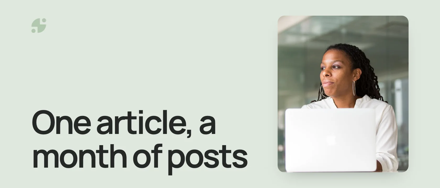 One article, a month of posts. A woman working at a laptop in an office.