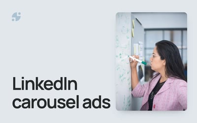 LinkedIn carousel ads. A manager planning a campaign on a whiteboard.